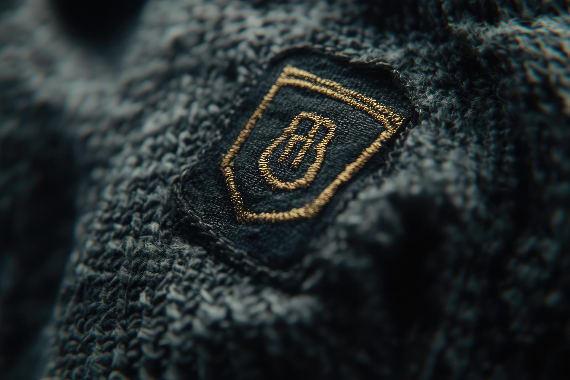 sample futuristic embroidered patch on black tech fabric