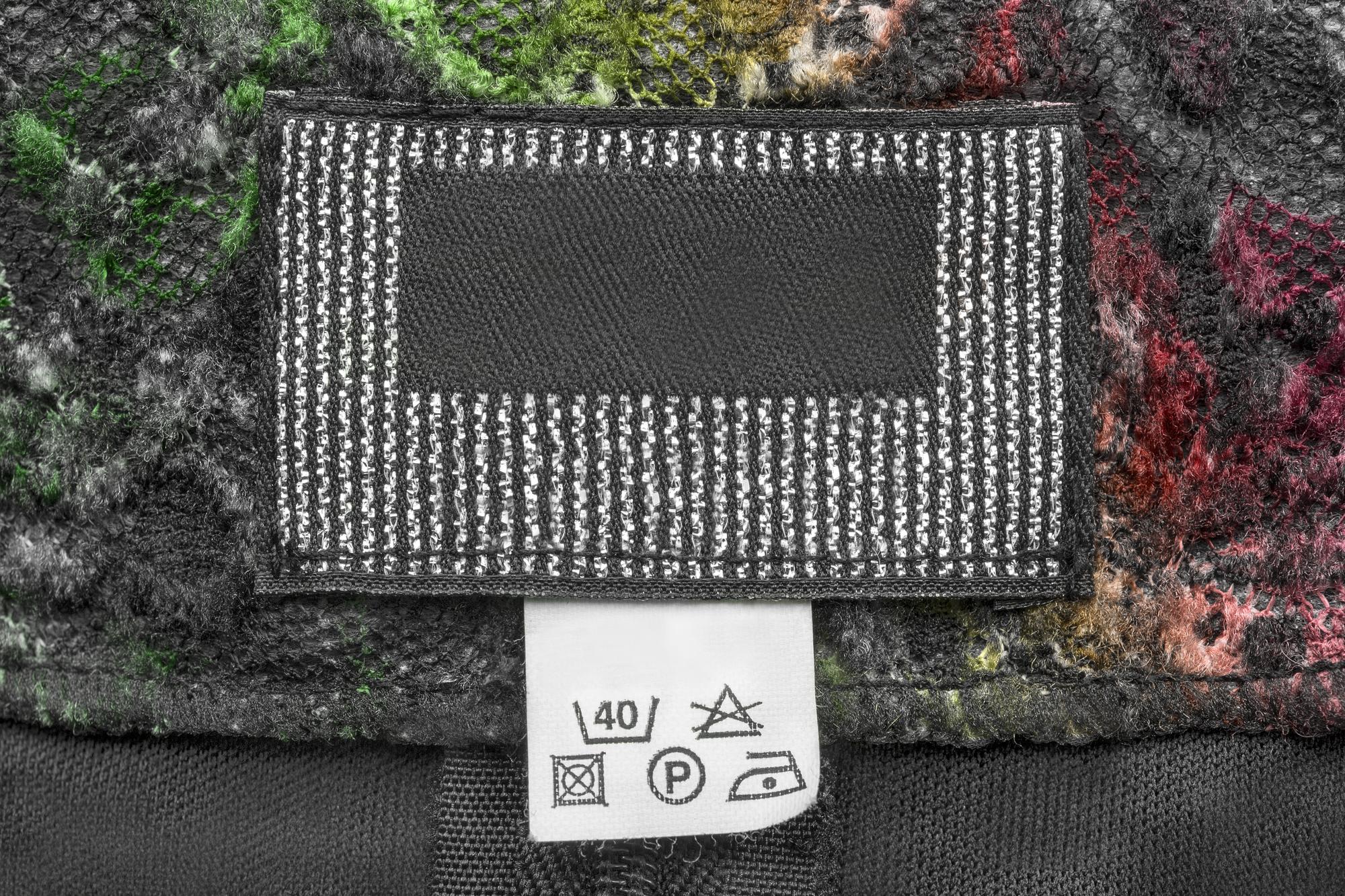 three sample embroidered patches on futuristic fabric